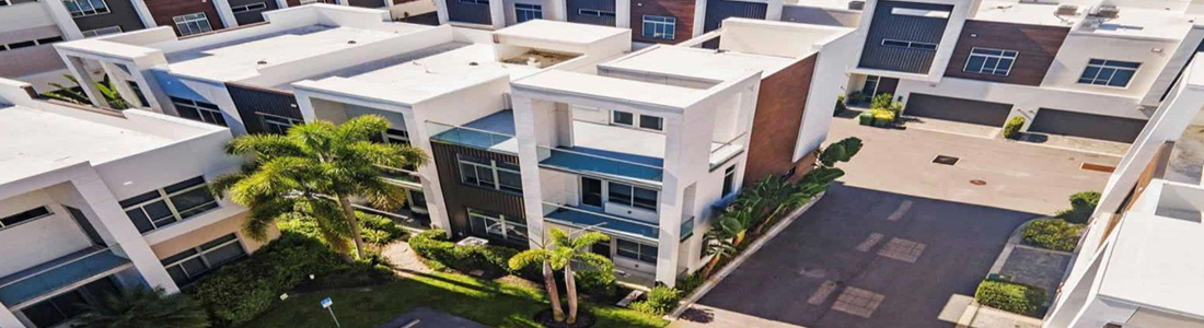 Sarasota Townhome Restoration: Solving Hidden Water Intrusion & Exterior Failures at The Q Townhomes